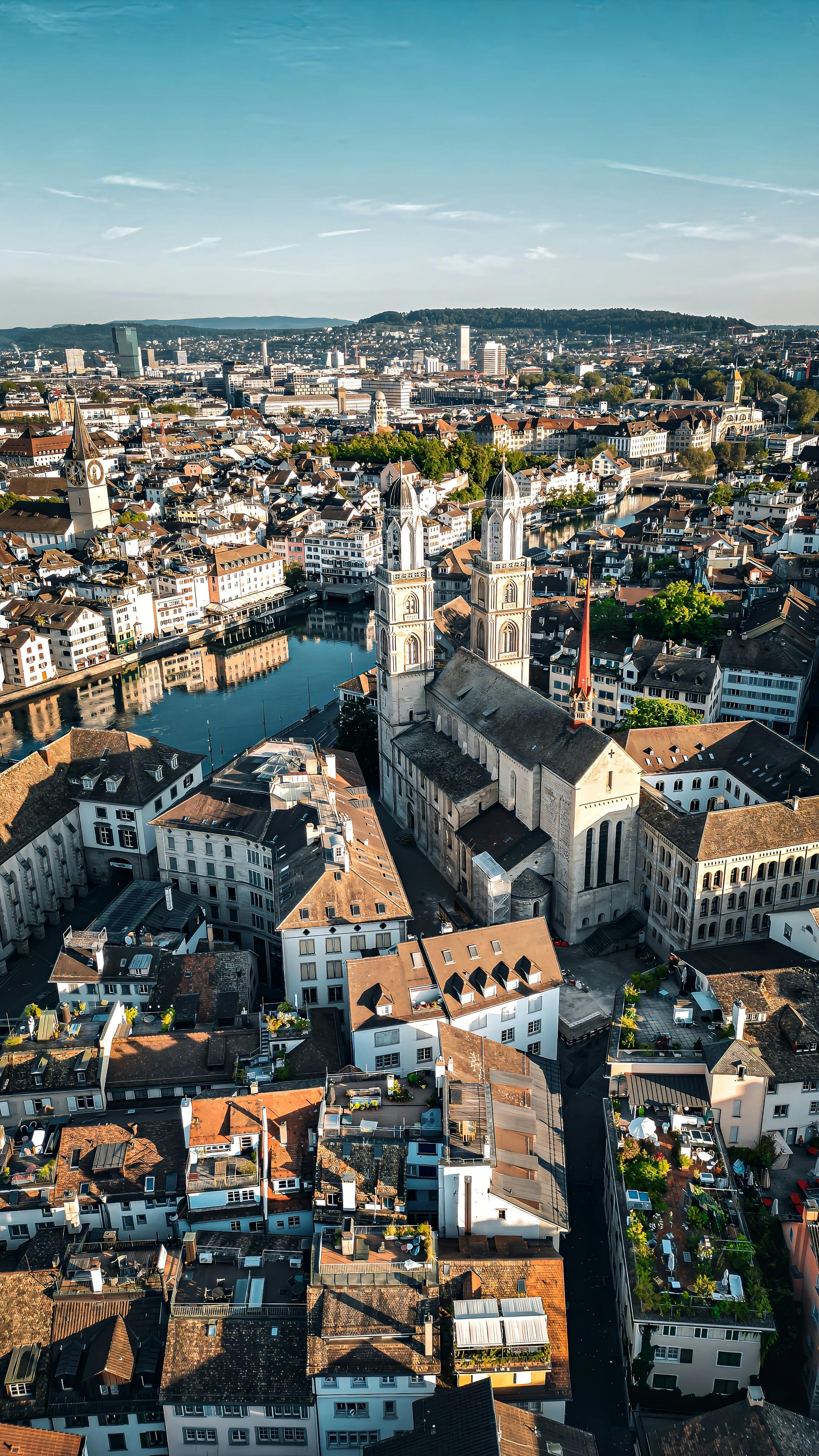 Zurich cityscape with river and Grossmünster church, Switzerland
